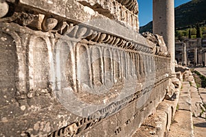 Close up view of marble block frieze and architecture ornament details. Ephesus (Efes) Ancient City ruins.