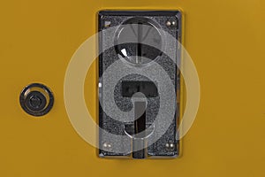 Close up view of metal slot machine.