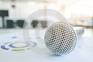 Close up view microphone on table in meeting room with blurred background