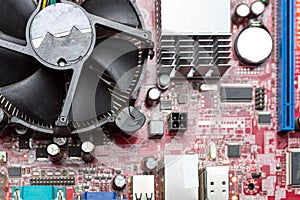 Close-up view of the motherboard of computer with PCU cooler. Top view, background.