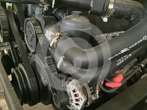 Close up view on new bus engine components, parts and elements