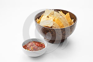 Close up view of nice red salsa and corn chips