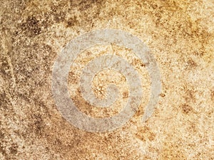 Close-up view of an old antique drumhead surface. Natural leather texture background from musical instrument. photo