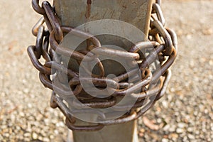 Close-up view of old rusty chain links.