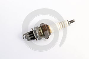 Old used spark plug isolated on white background