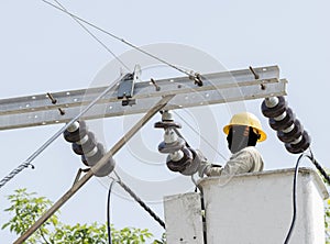 Close-up view of one electrician is repairing electric power sy