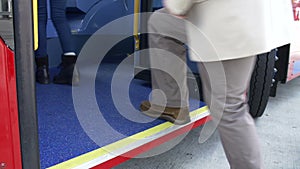 Close Up View Of Passenger's Feet Boarding Bus