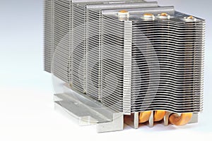 A close up view of passive CPU cooler with the aluminum fin and copper heat pipe structure