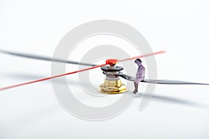 Close up view of people figure on pointer of clock photo