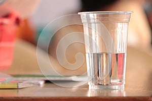 Close  up view of plastic cup inthe  blur background