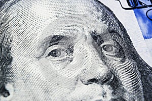 Close up view Portrait of Benjamin Franklin on the one hundred dollar bill. Background of the money. 100 dollar bill with Benjamin