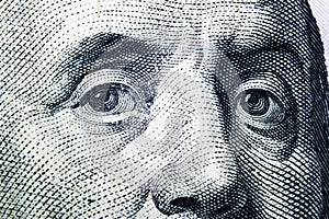 Close up view Portrait of Benjamin Franklin on the one hundred dollar bill. Background of the money. 100 dollar bill with Benjamin