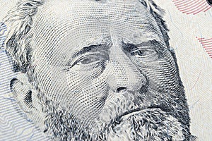 Close up view Portrait of Ulysses S. Grant on the one fifty dollar bill. Background of the money. 50 dollar bill with Ulysses S. G