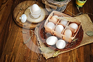 Close-up view of raw chicken eggs in egg box