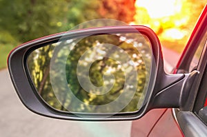 Close-up view of rearview mirror on the car