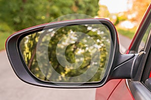 Close-up view of rearview mirror on the car