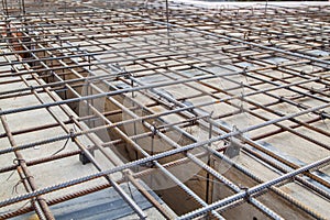 close up view of reinforcement of concrete with metal rods conne