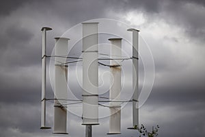 Close up view of rotating holder for solar panels on cloudy sky background. Europe.