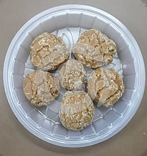 Close-up view of the round blocks of jaggery