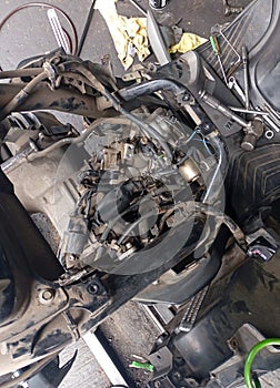 Disassembled motorcycle engine during repair