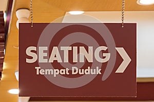 Close-up view of the seating direction signboard