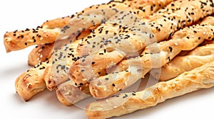 Close up view of sesame seed-covered breadsticks