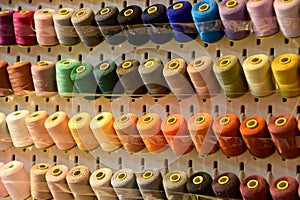 Close up view of a set of sewing threads. Multi-colored thread.