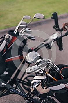 Close-up view of shiny golf clubs in golf