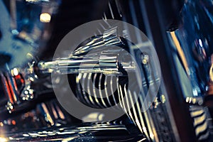 Close up view of a shiny motorcycle engine. Macro