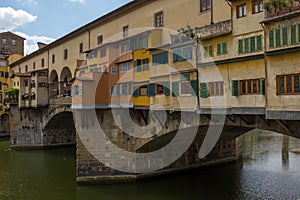 A close up view from the side of the famous Ponte Vecchio, this bridge that crosses the River Arno in Florence was the