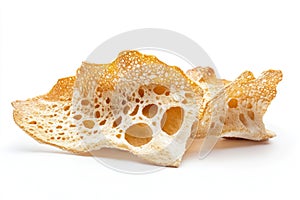 A close-up view of a single slice of bread on a clean, white surface