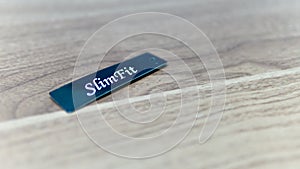 Close up view of slim fit tag for jeans