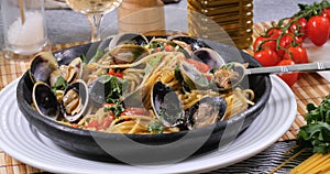 Close up view of spaghetti alle vongole clams photo