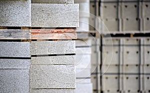 Close-up view of stacked cement bricks in a construction factory in Spain