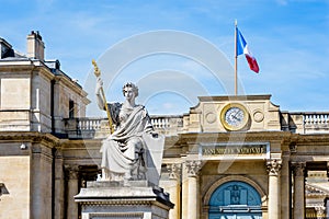 The statue in front of the Palais Bourbon which houses the French National Assembly in Paris, France