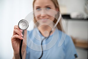 Close up view of stethoscope holding by therapist practitioner