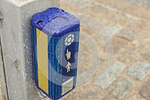 Close up view of stoplight regulation button for pedestrians. Safety and technology concept. photo