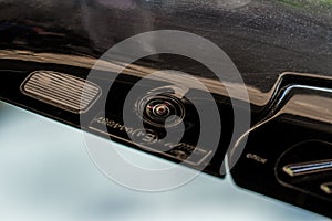 Close up view of surround view camera system on modern car side rear mirror.