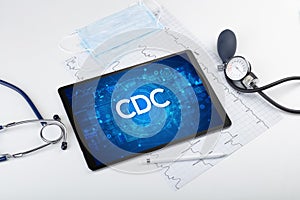 Close-up view of a tablet pc with medical abbreviation