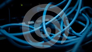 Close up view of tangled blue cables and connectors