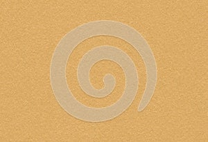 Close up view of textured golden creative paper background.