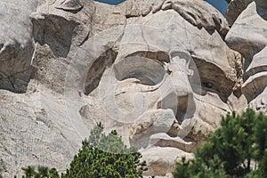 Close-up view of Theodore Roosevelt carved into the mountainside at Mt. Rushmore