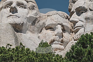 Close-up view of Theodore Roosevelt carved into the mountainside at Mt. Rushmore