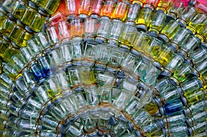 Close-Up View of Tiny Glass Bottles Wired Together