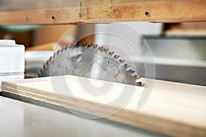Close up view of a toothed circular saw blade