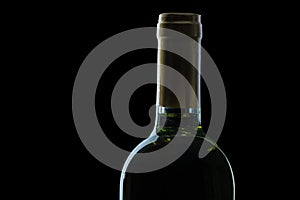 Close up view on top of bottle white wine black background