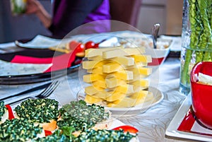 Close up view of tower made from cheese blocks