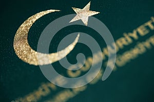 A close up view of Turkish Flag sign in a green Passport cover