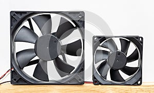 Close-up view of the two computer fans isolates of different sizes.