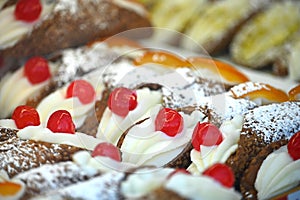 Close up view of typical sicilian cannoli pastry stuffed with ricotta